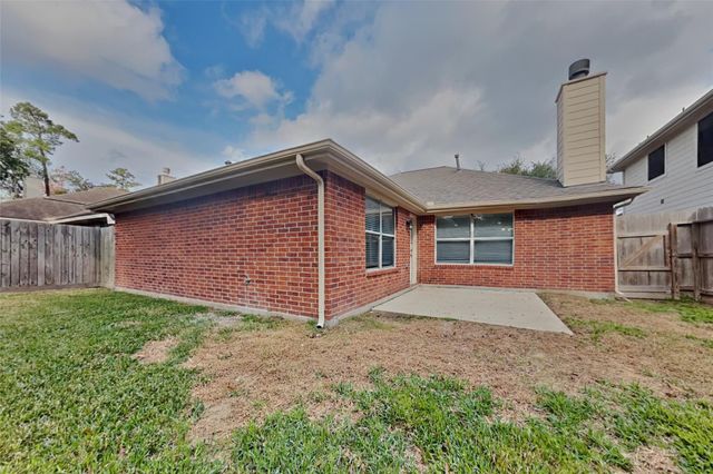 26925 Carriage Manor Lane, Kingwood, TX 77339