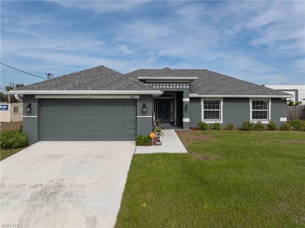 2021 NE 36th TER, CAPE CORAL, FL 33909 — exterior
