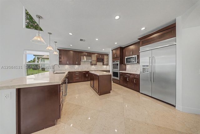 11406 Canyon Maple Blvd, Davie, FL 33330