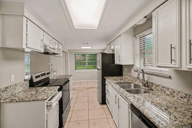 9707 Mackworth Drive, Stafford, TX 77477