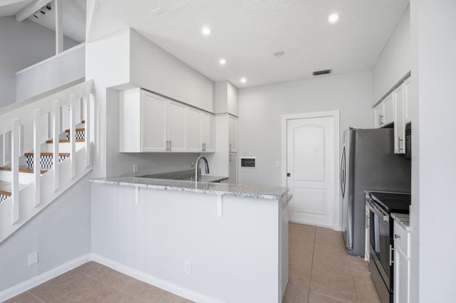 207 Woodsmuir Court, Palm Beach Gardens, FL 33418