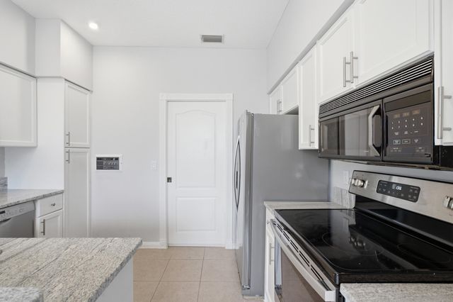 207 Woodsmuir Court, Palm Beach Gardens, FL 33418