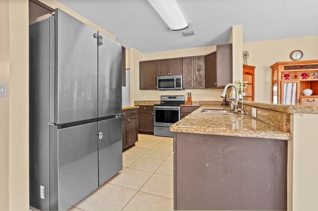 9670 Wolcott Place, Wellington, FL 33414