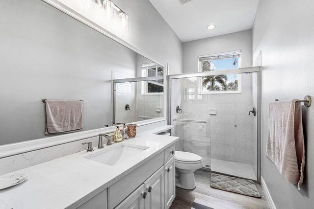 11750 Osprey Pointe Circle, Wellington, FL 33449