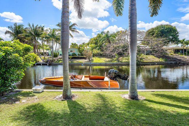 7745 W Lake Drive, Lake Clarke Shores, FL 33406