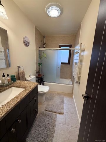 7314 69th Avenue, Middle Village, NY 11379