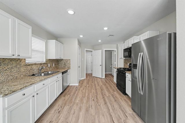 11135 N Lake Mist Lane, Willis, TX 77318