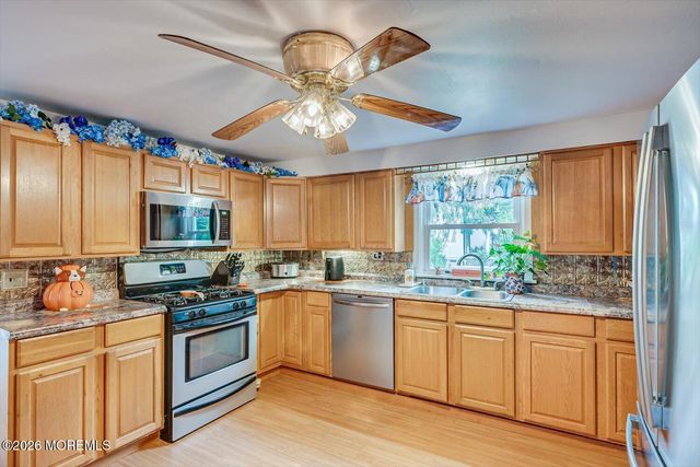62 Taylors Mills Road, Manalapan, NJ 07726