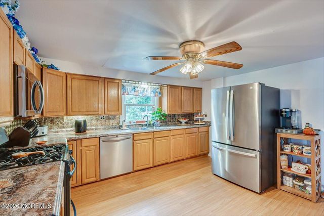 62 Taylors Mills Road, Manalapan, NJ 07726
