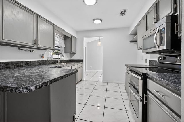 10464 BRIDLEWOOD AVENUE, Orlando, FL 32825