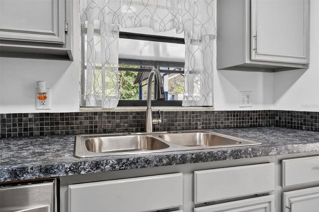 10464 BRIDLEWOOD AVENUE, Orlando, FL 32825