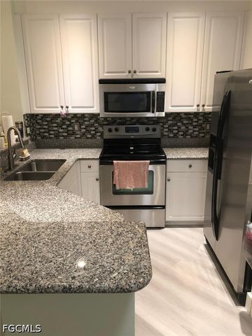 8706 Athena CT, Lehigh Acres, FL 33971