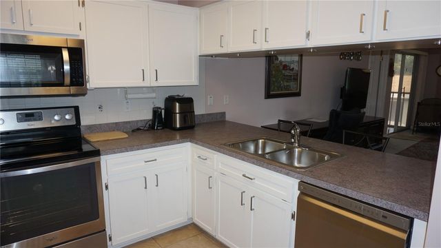 7713 HILLSIDE COURT 203, Hudson, FL 34667