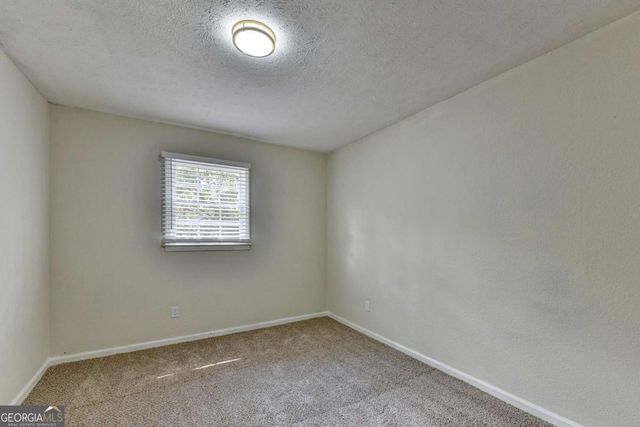 298 W Wind Drive SW, Lilburn, GA 30047