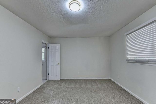 298 W Wind Drive SW, Lilburn, GA 30047
