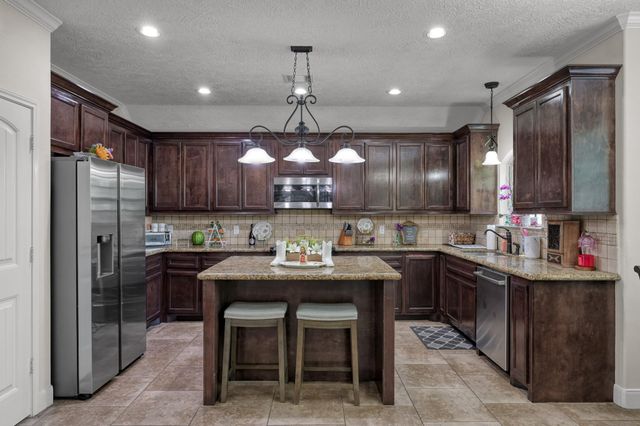 9766 Twin Shores Drive, Willis, TX 77318