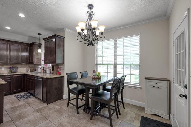 9766 Twin Shores Drive, Willis, TX 77318