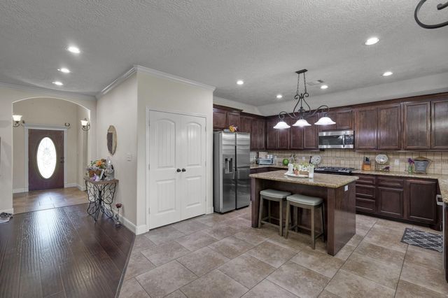 9766 Twin Shores Drive, Willis, TX 77318