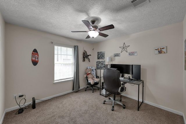 9766 Twin Shores Drive, Willis, TX 77318