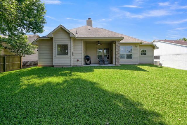 9766 Twin Shores Drive, Willis, TX 77318