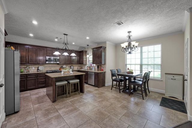 9766 Twin Shores Drive, Willis, TX 77318