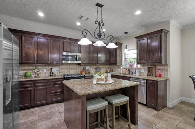 9766 Twin Shores Drive, Willis, TX 77318