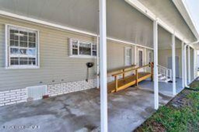 701 Lark Drive, Barefoot Bay, FL 32976