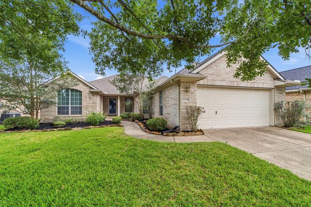 21318 Timber Pines Drive, Spring, TX 77388