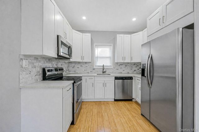 127-18 89th Avenue, Richmond Hill, NY 11418