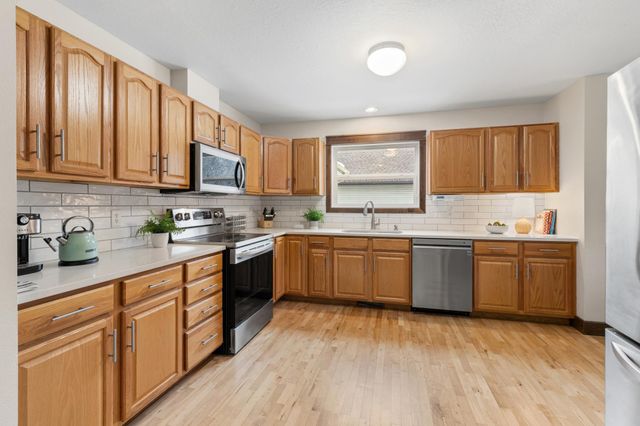 413 Orleans Court N, Champlin, MN 55316