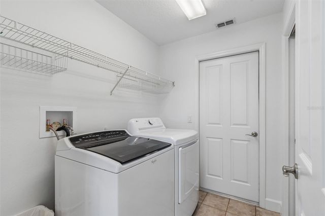 5414 AVENAL DRIVE, Lutz, FL 33558