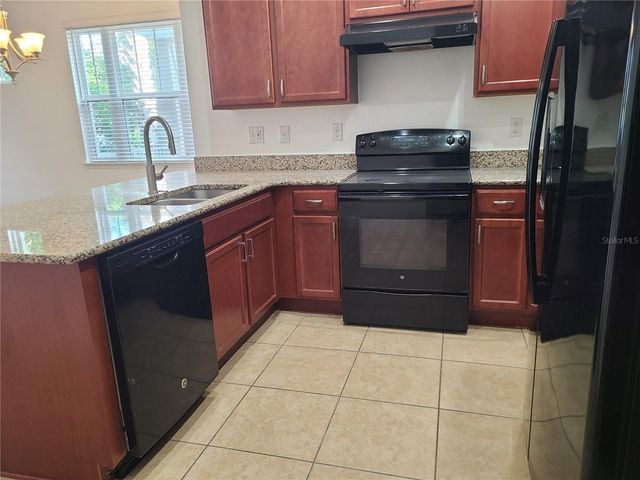 13825 BENAVENTE AVENUE, Orlando, FL 32827