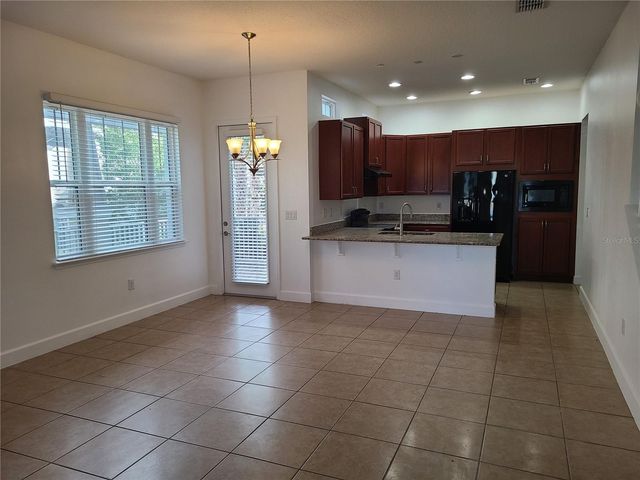 13825 BENAVENTE AVENUE, Orlando, FL 32827