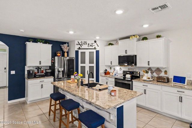 1873 Farmhouse Road SE, Palm Bay, FL 32909