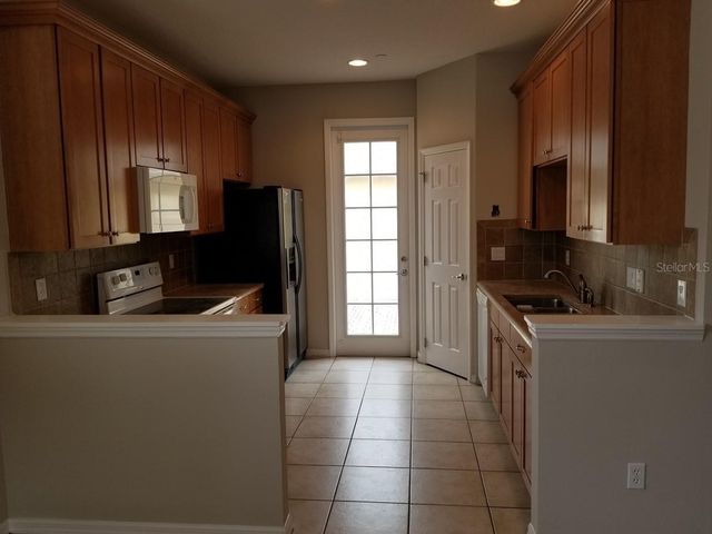 9101 CAMDEN GARDENS STREET, Orlando, FL 32827