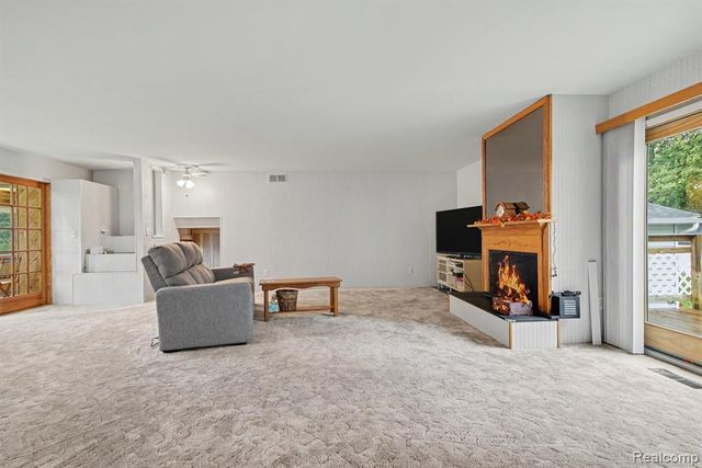 1564 Delmonte Street, Wolverine Lake, MI 48390