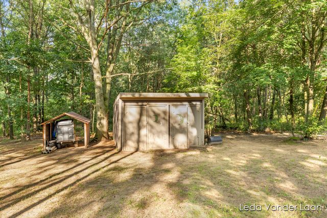 9520 Hidden Bluff Drive, Rockford, MI 49341