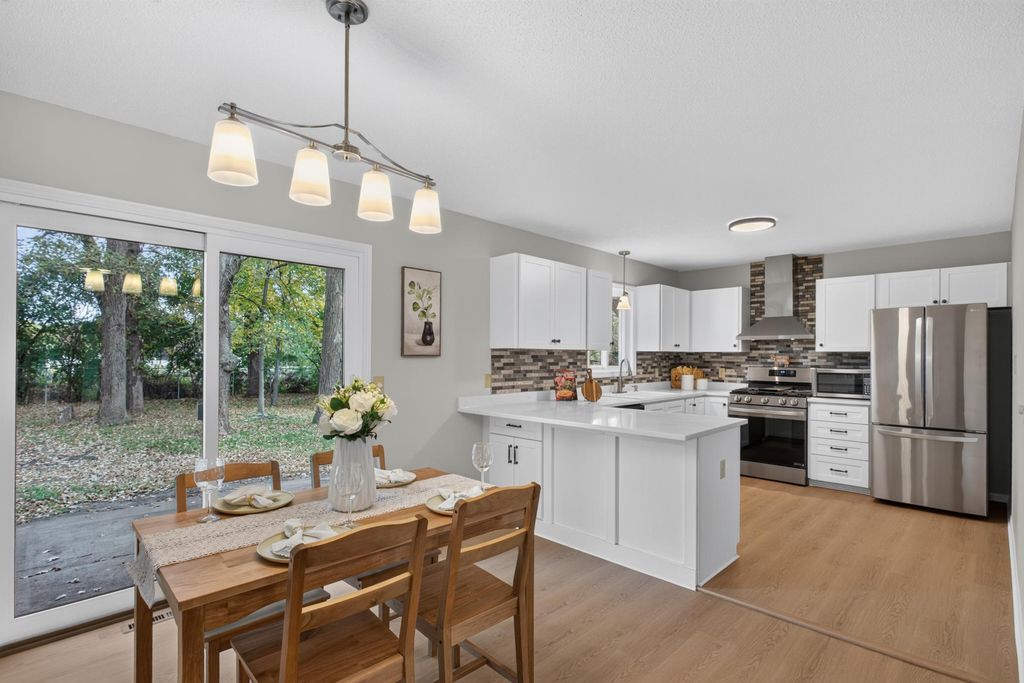 12007 Wedgewood Drive NW, Coon Rapids, MN 55433 — exterior