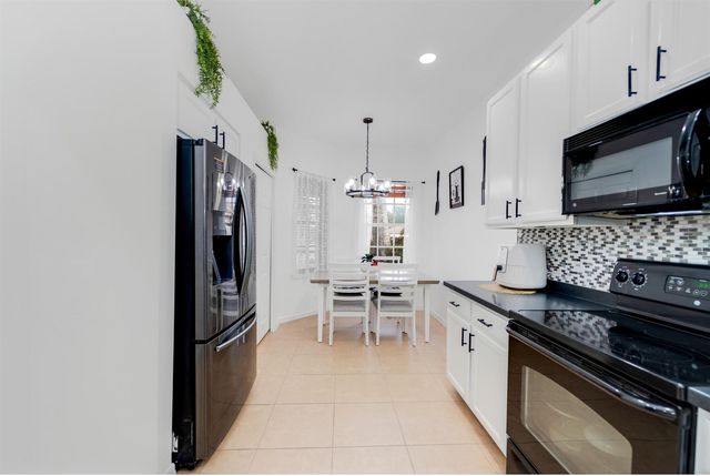 14190 Fall Creek Court, Naples, FL 34114