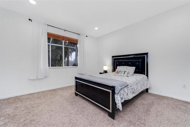 14190 Fall Creek Court, Naples, FL 34114