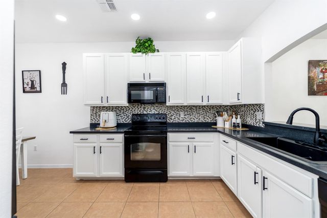 14190 Fall Creek Court, Naples, FL 34114