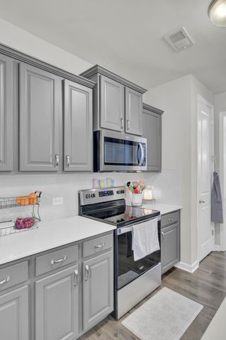 1087 Magnolia Warbler Way, Ravenel, SC 29470