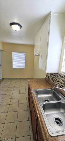 1342 E 77th Place, Los Angeles, CA 90001