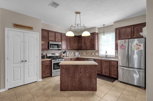 409 Mildred Street, Cleveland, TX 77328