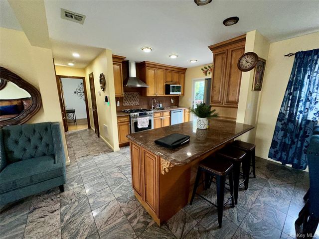 1316 McClure Avenue, Elmont, NY 11003