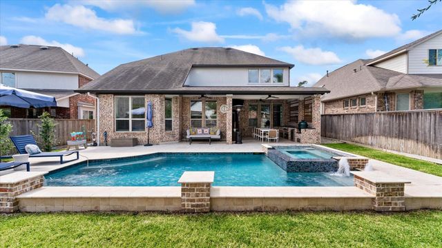 14 Whispering Thicket Place, Tomball, TX 77375