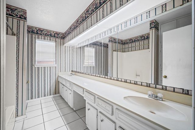 12026 Sugar Springs Drive, Houston, TX 77077