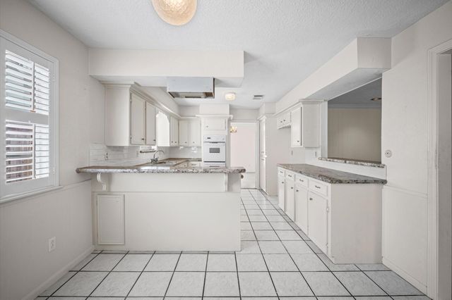 12026 Sugar Springs Drive, Houston, TX 77077