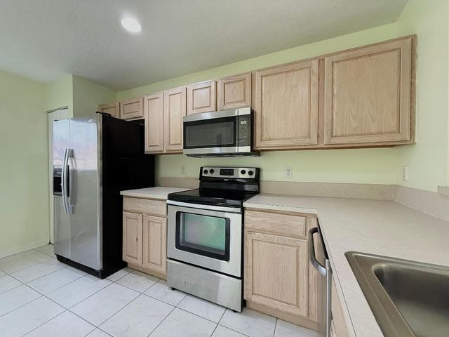 1910 Lakeview Drive W, Royal Palm Beach, FL 33411