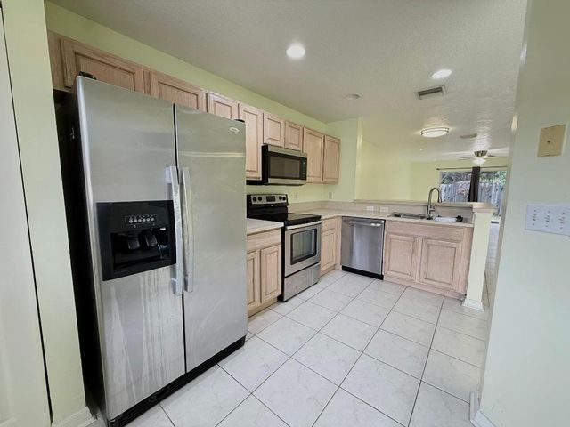 1910 Lakeview Drive W, Royal Palm Beach, FL 33411